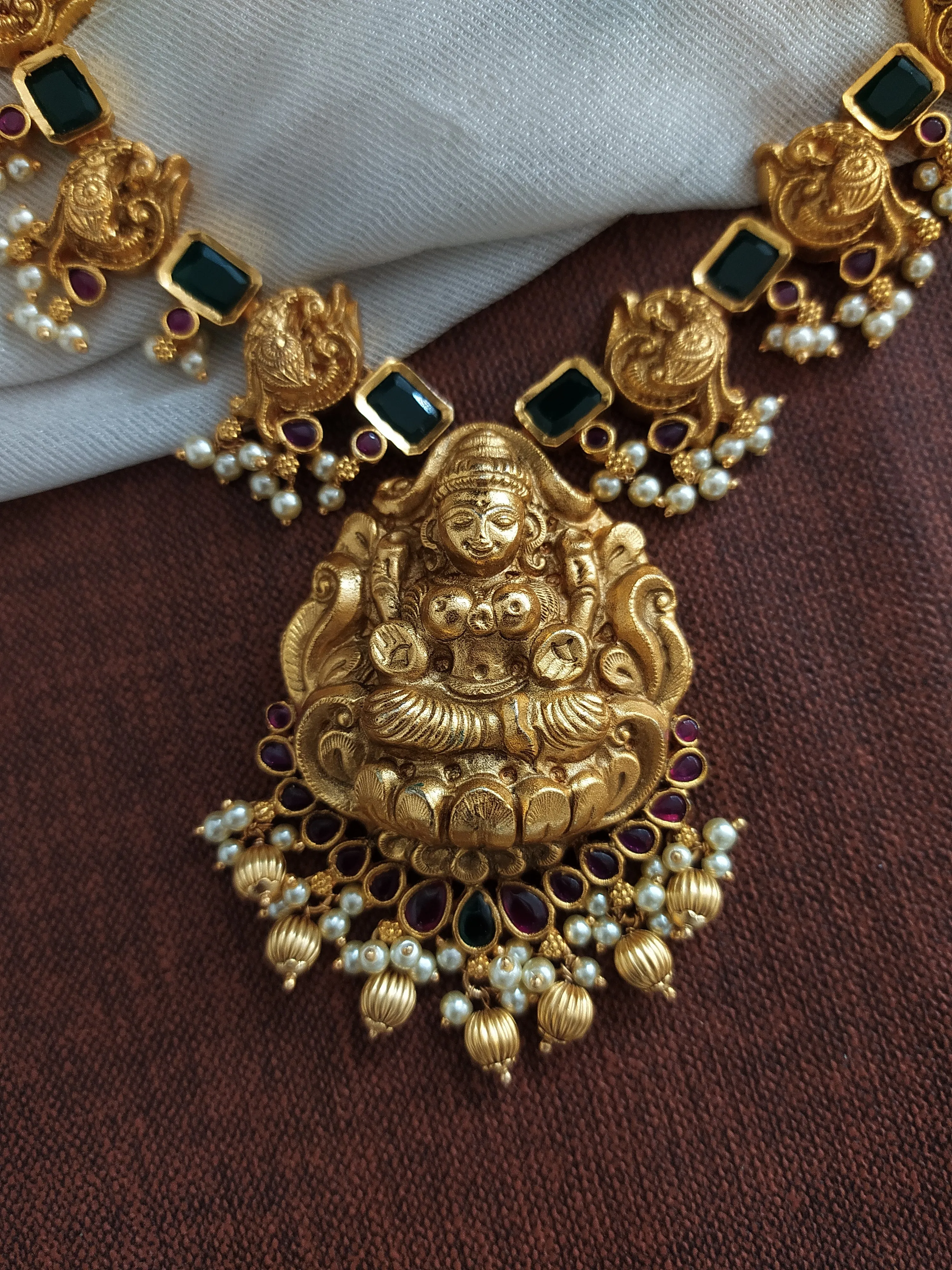 Antique Gold-plated Necklace With Lord Lakshmi & Small Pearls in Red, Green Color