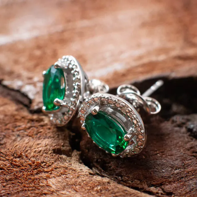 Harmony and Balance: Emerald and Diamond Stud Earrings