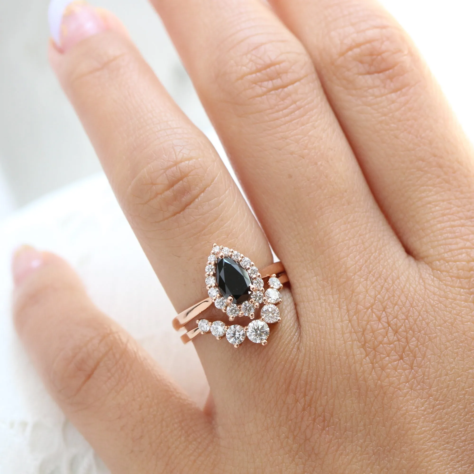 Pear Black Diamond Engagement Ring in Tiara Halo Diamond Tapered Band