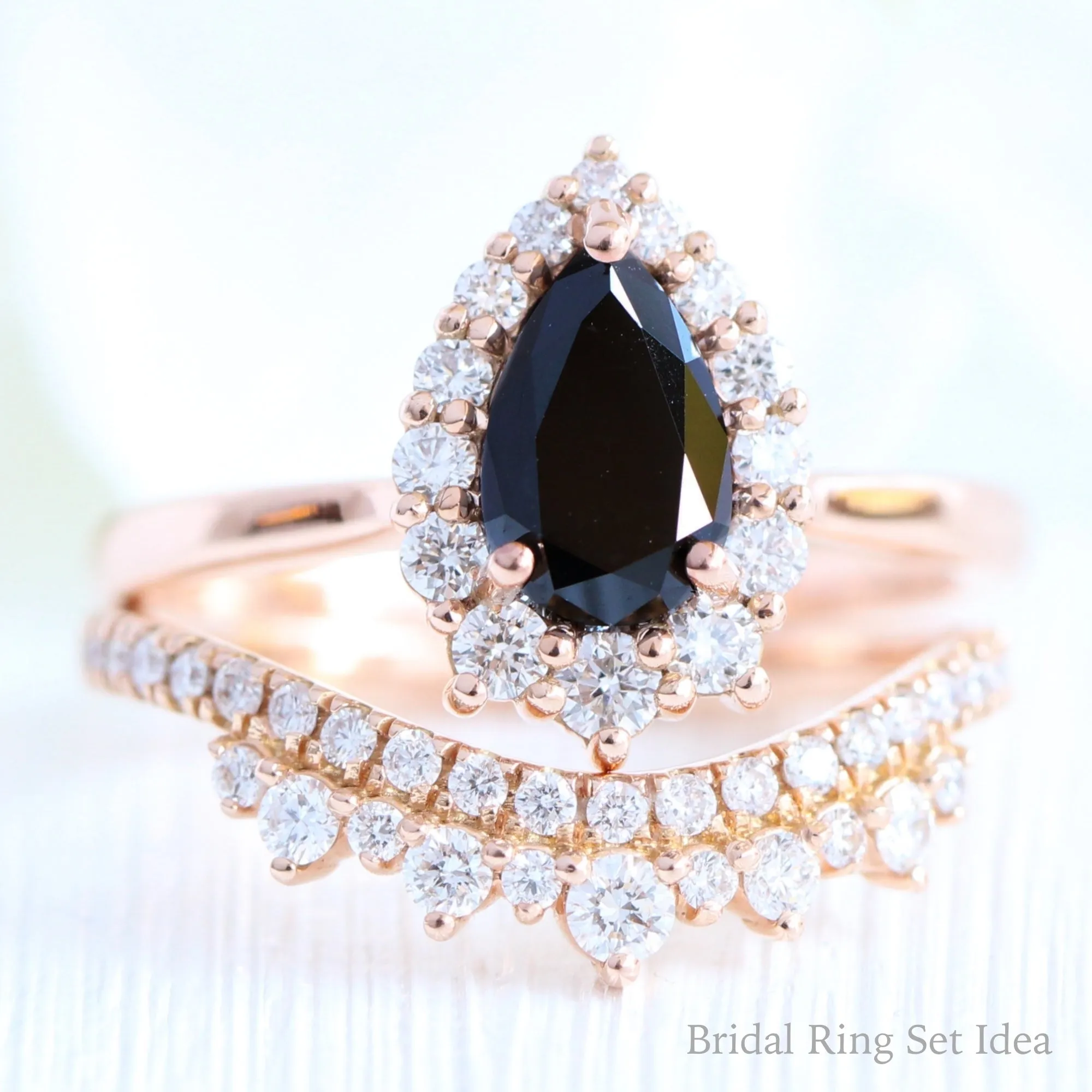 Pear Black Diamond Engagement Ring in Tiara Halo Diamond Tapered Band