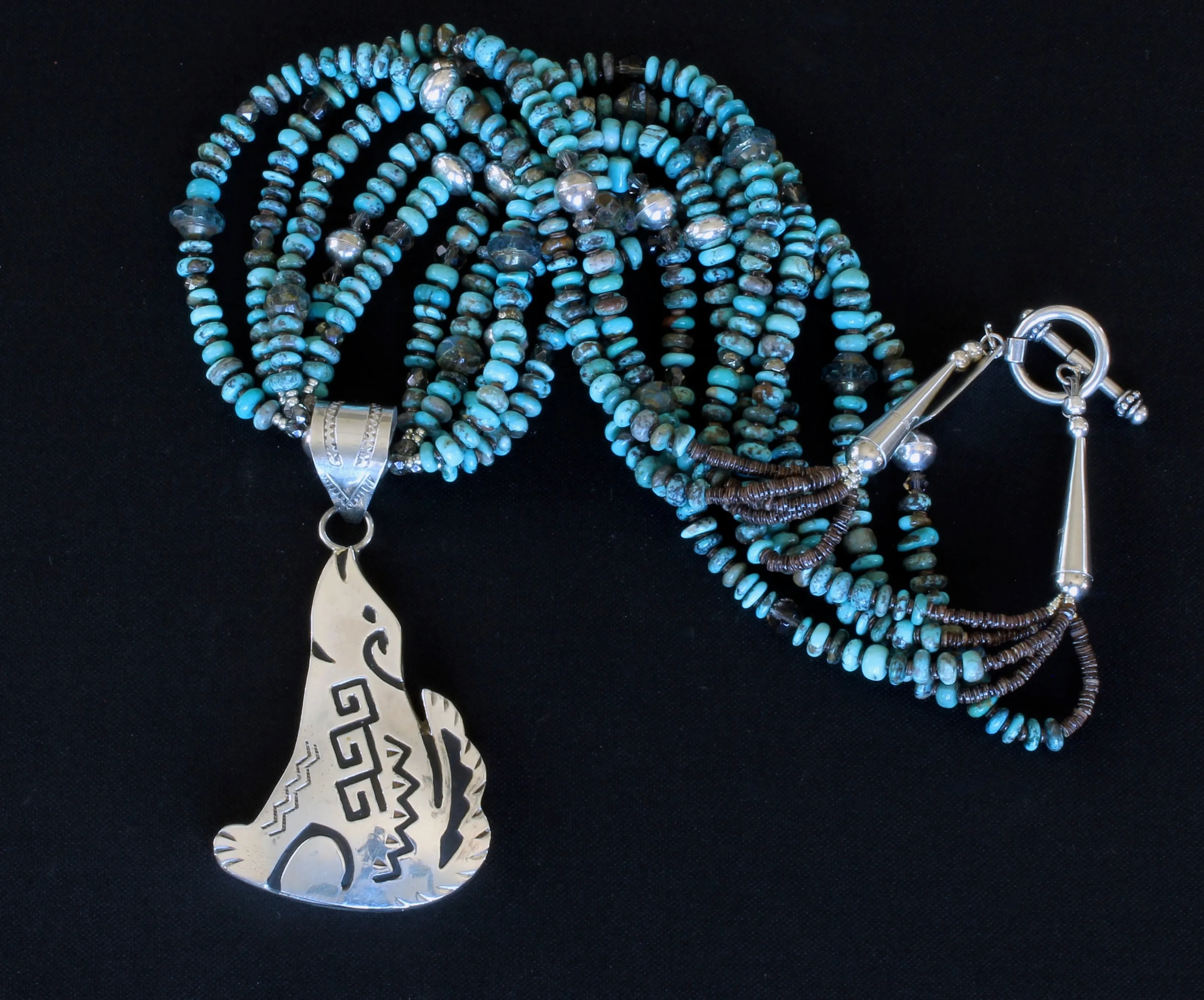 Sterling Silver Coyote Pendant with 5 Strands of Turquoise Rondelles, Bench-Made Sterling Silver Beads, Czech Glass Saucers & Faceted Rondelle Beads, Fire Polished Glass, and Sterling Silver Cones & Toggle Clasp