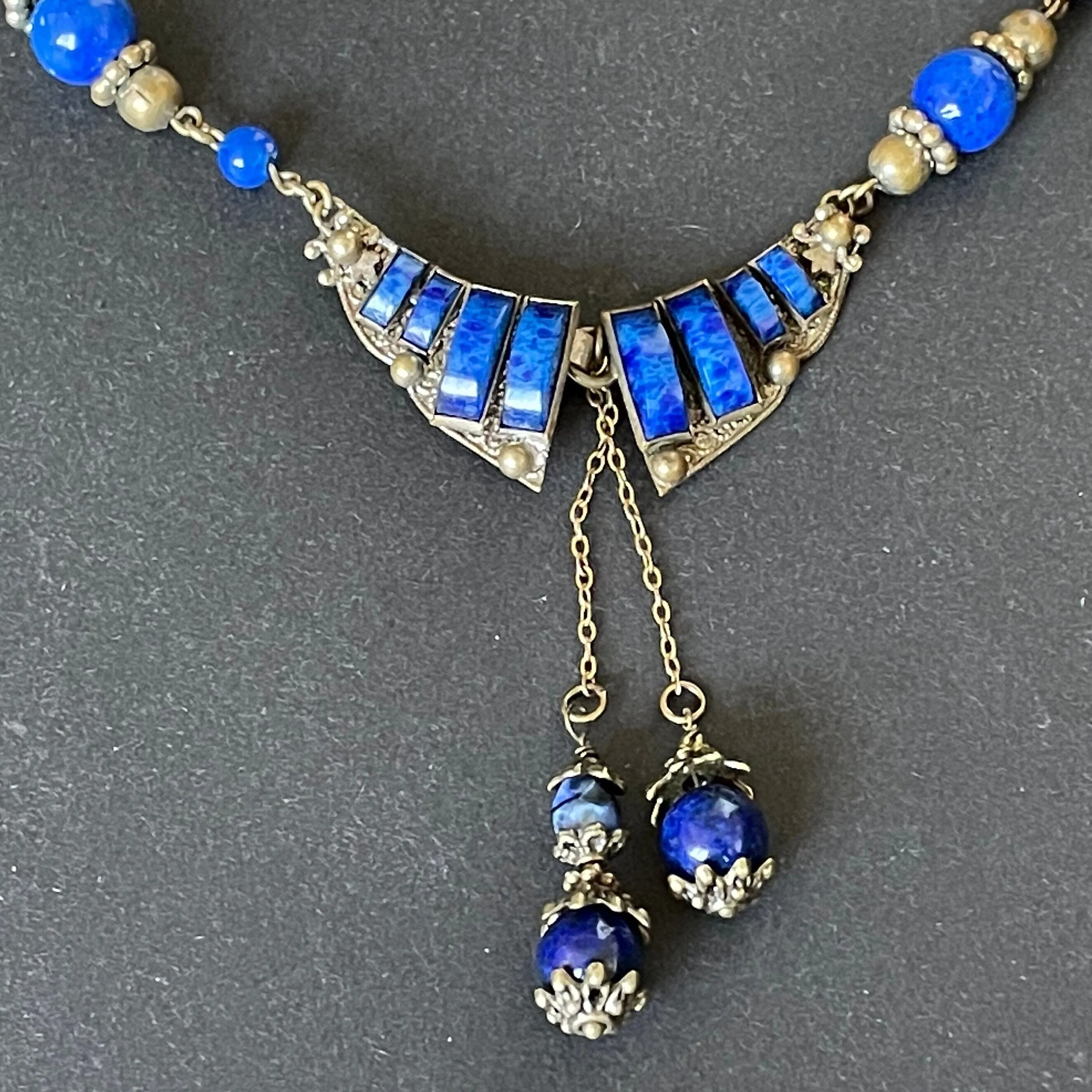 Vintage Art Deco Czech Max Neiger Brothers style lapis lazuli glass and gold tone negligee necklace, front fastening