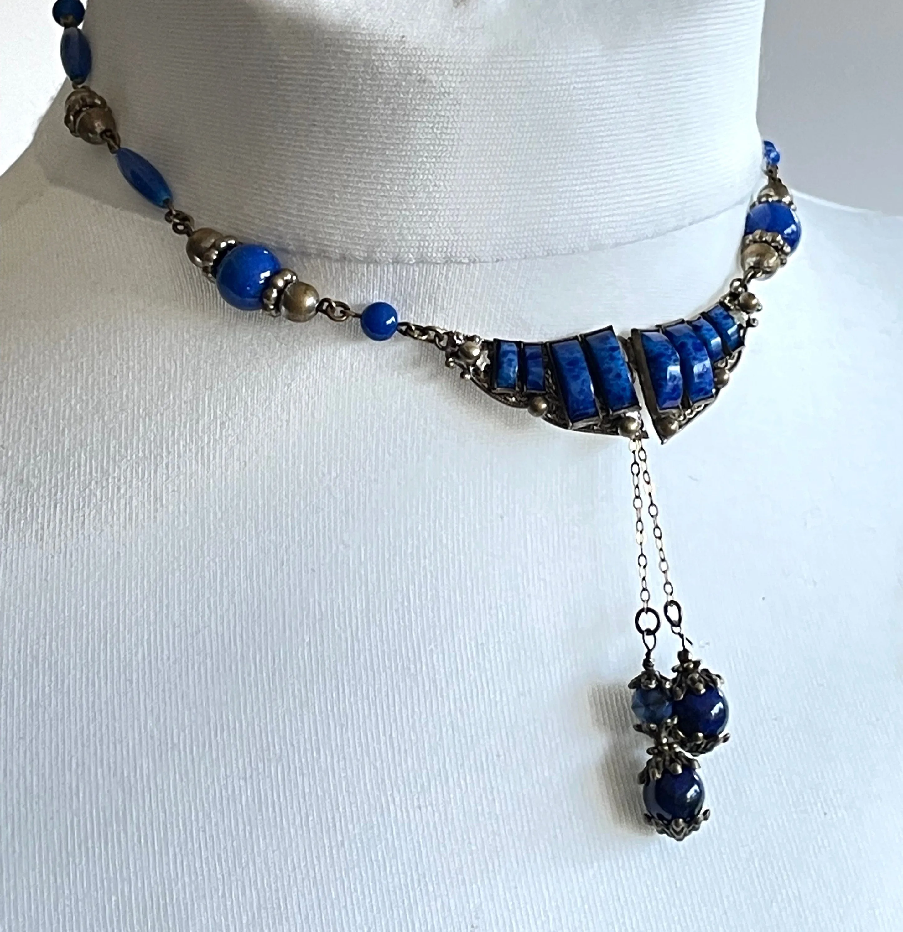 Vintage Art Deco Czech Max Neiger Brothers style lapis lazuli glass and gold tone negligee necklace, front fastening